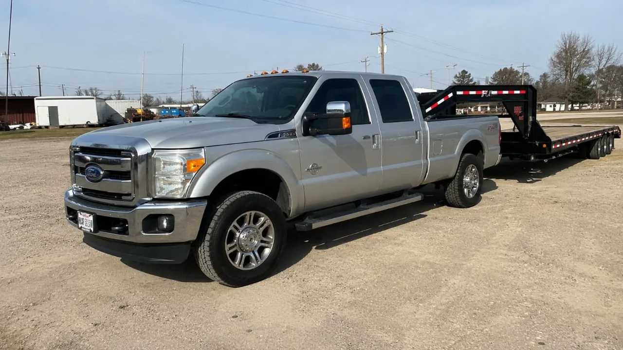 Hotshot truck with gooseneck trailer transporting commercial freight in Texas